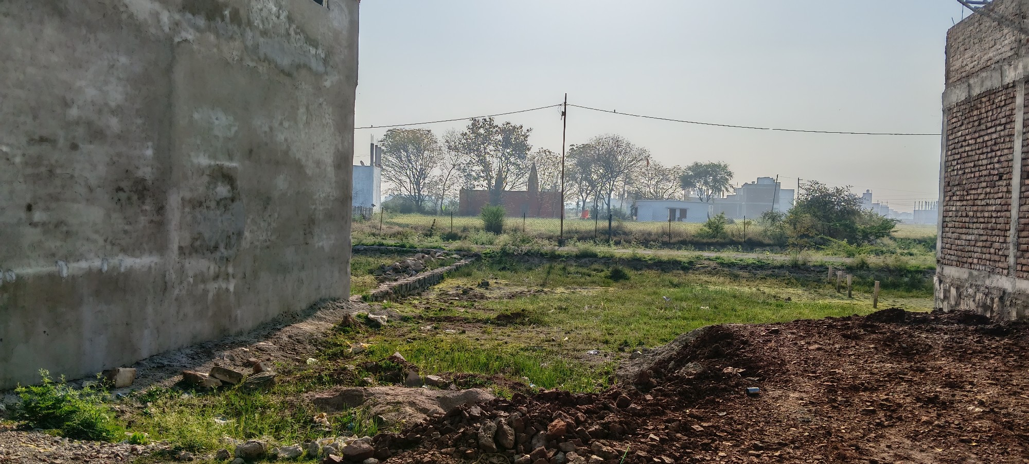 Residential Plot in Developed Colony with Road &amp; Electricity